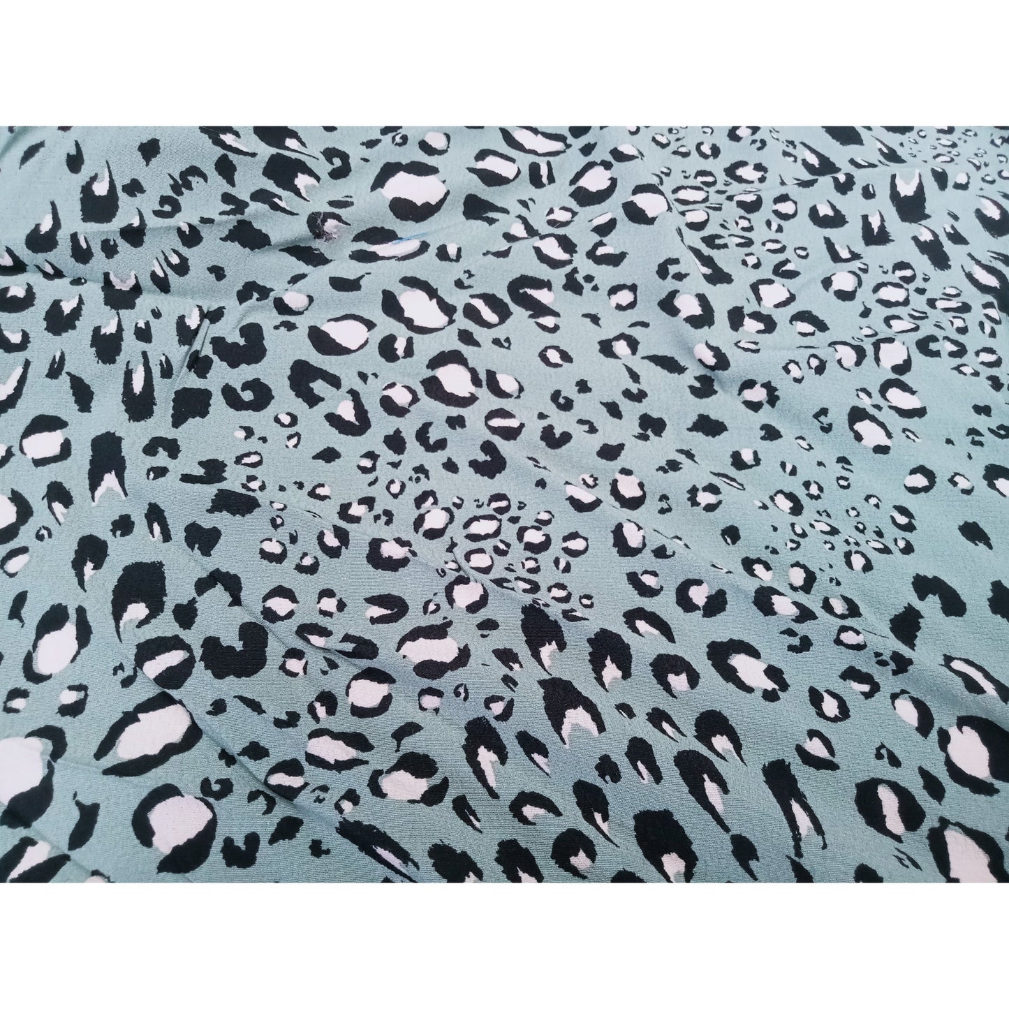 Lizzy - cheetah printed crepe fabric - sold by 1/2mtr