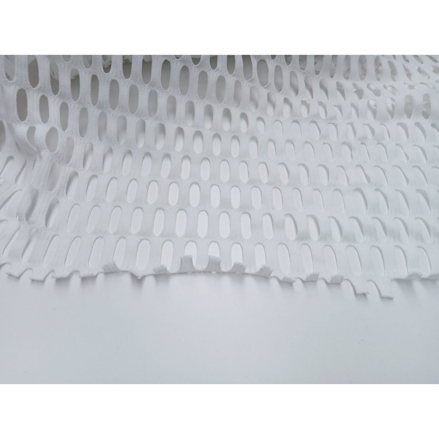 Laser cut stretch fabric -white sold by 1/2mtr
