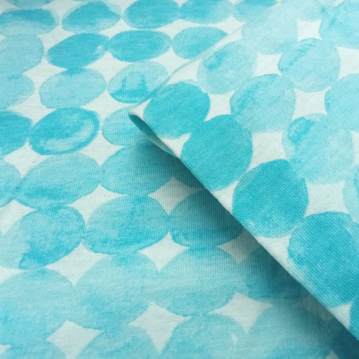 Water color polka dot interlock knit - sold by 1/2mtr