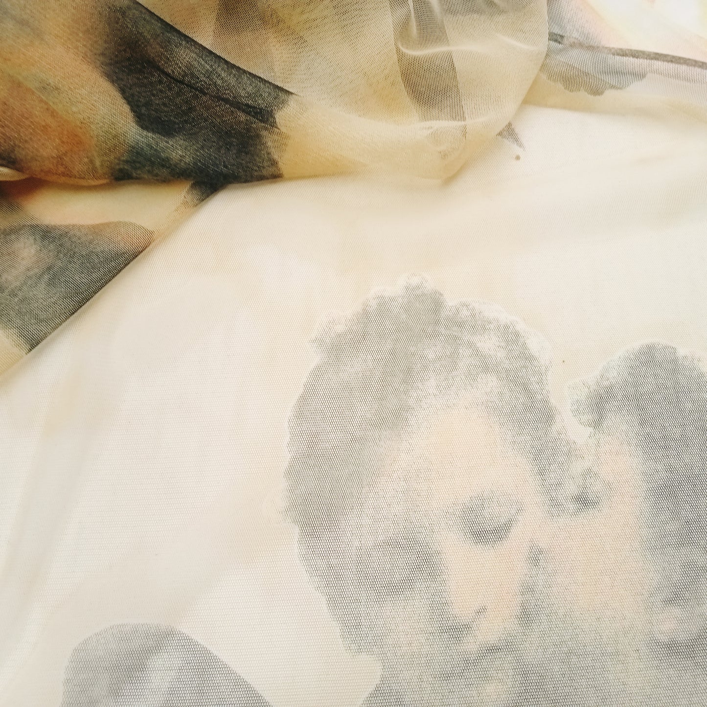 Angels - stretch mesh net fabric - sold by 1/2mtr