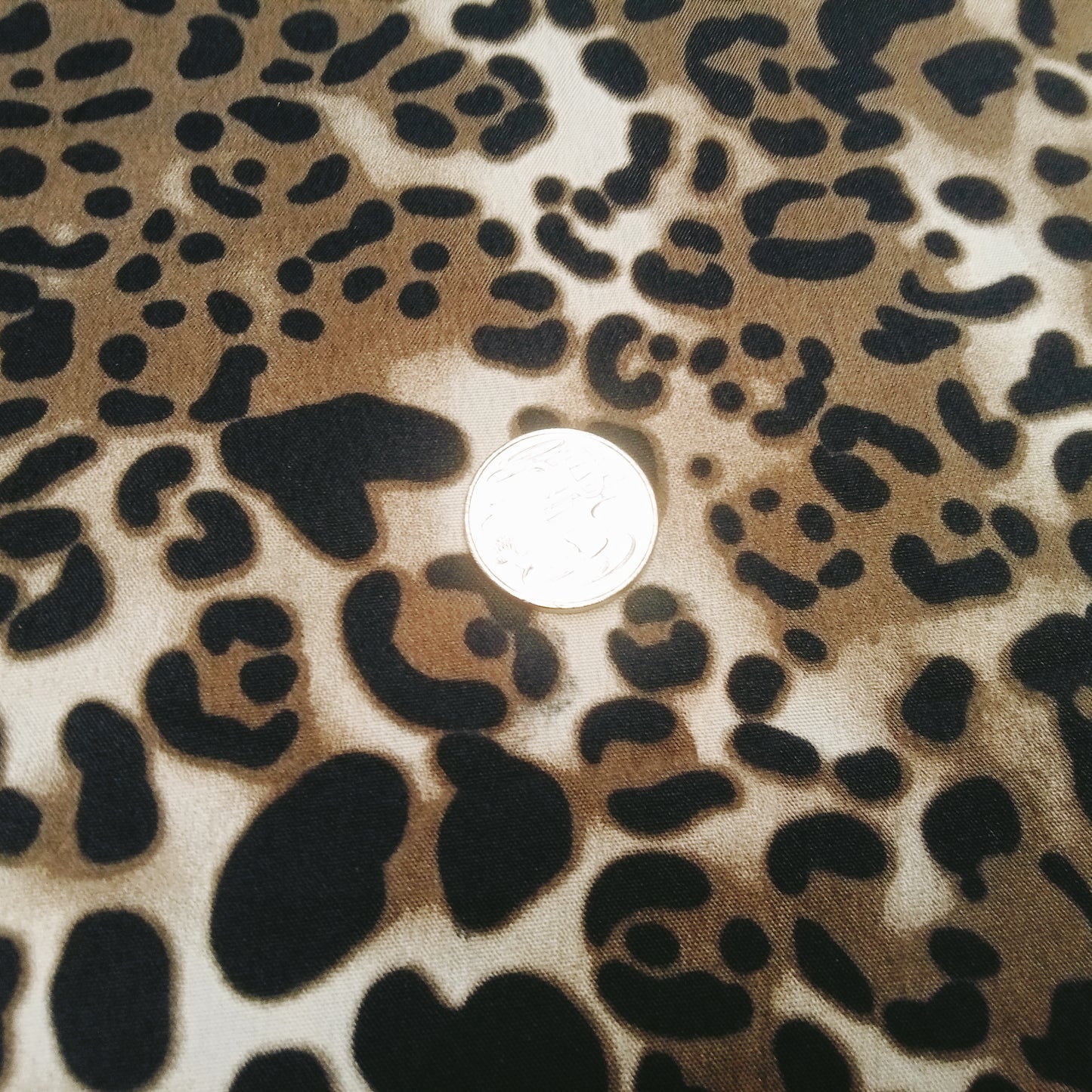 Leopard print woven fabric - sold by 1/2mtr