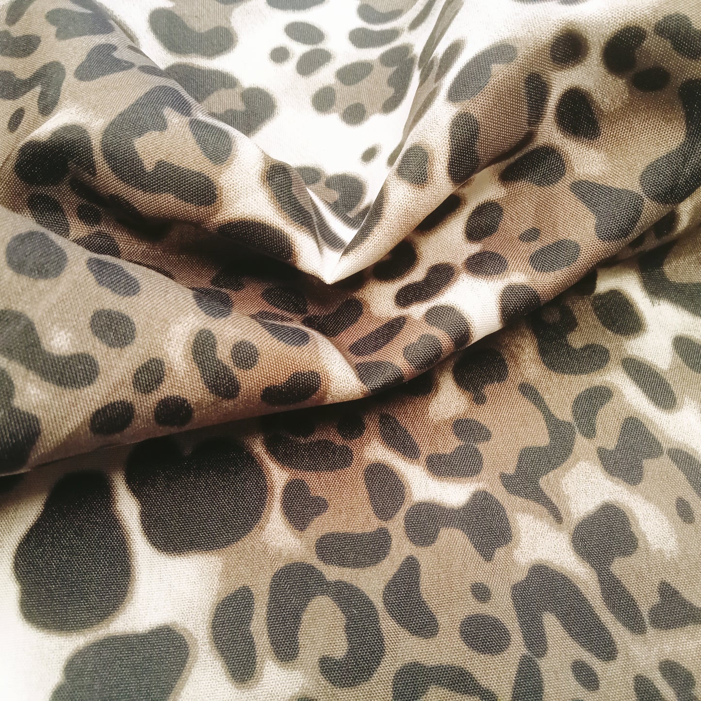 Leopard print woven fabric - sold by 1/2mtr