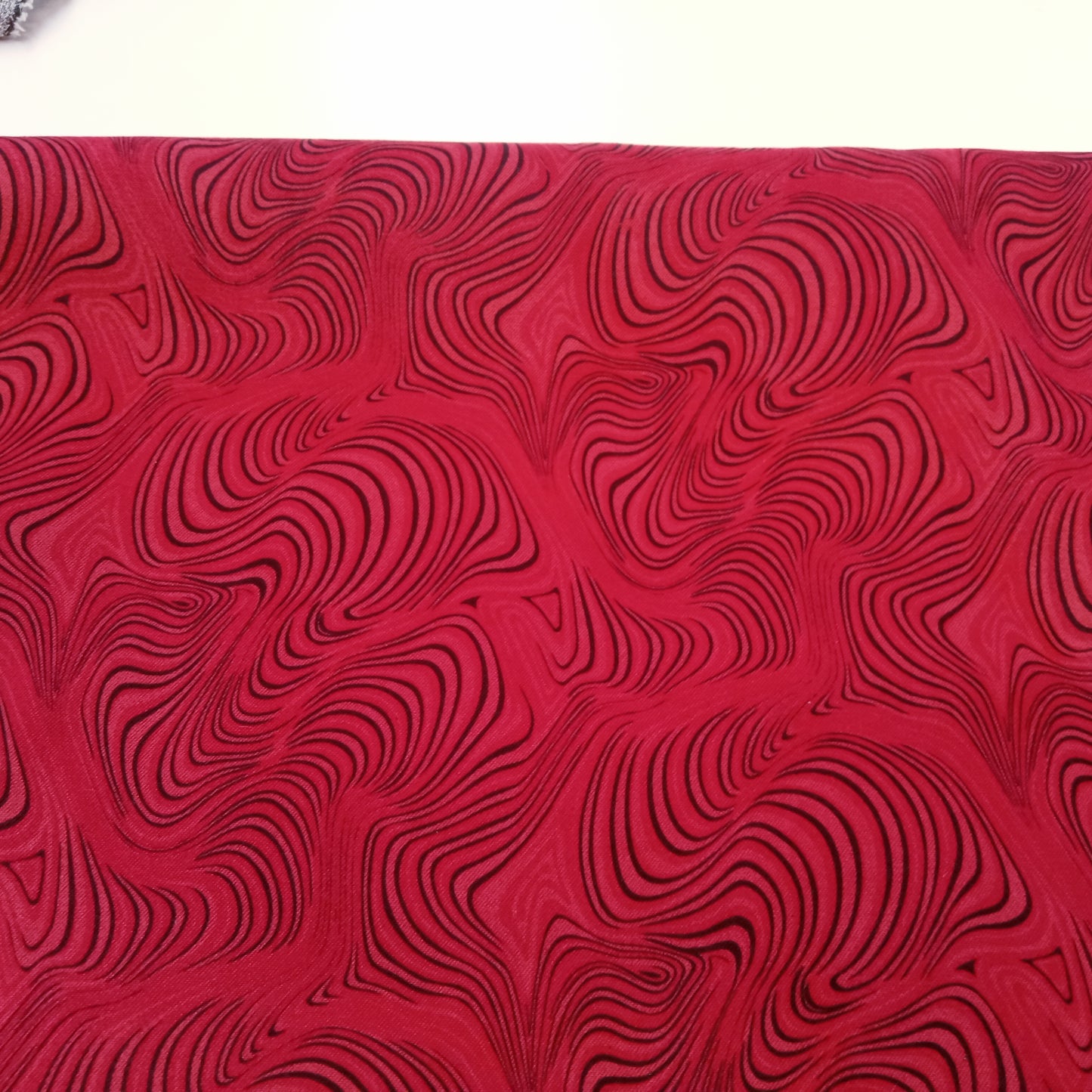 Raspberry - swirl stretch moleskin - sold by 1/2mtr