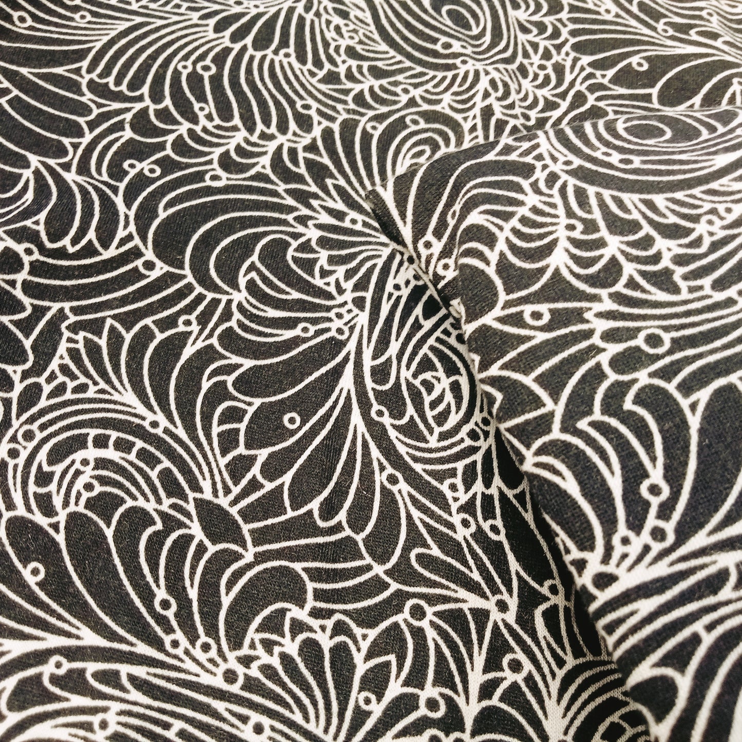 paisley printed knit jersey - sold by 1/2mtr