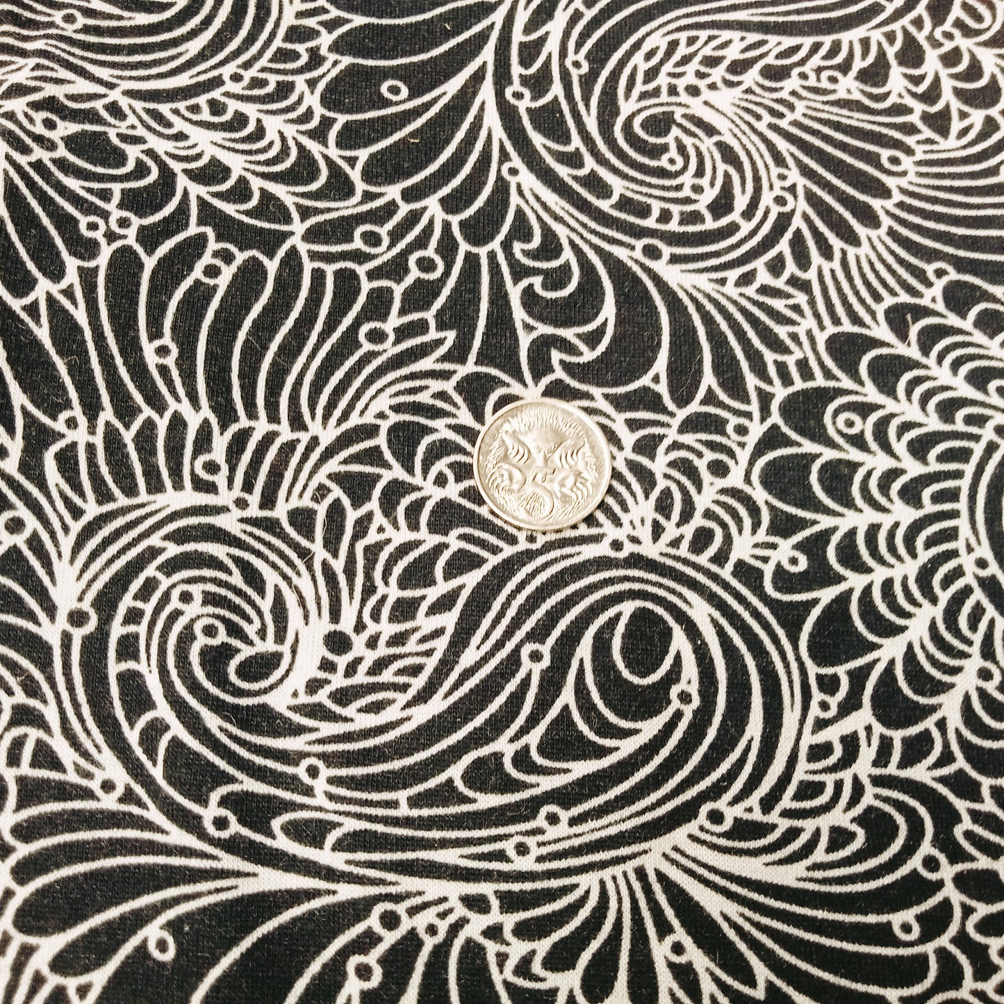 paisley printed knit jersey - sold by 1/2mtr