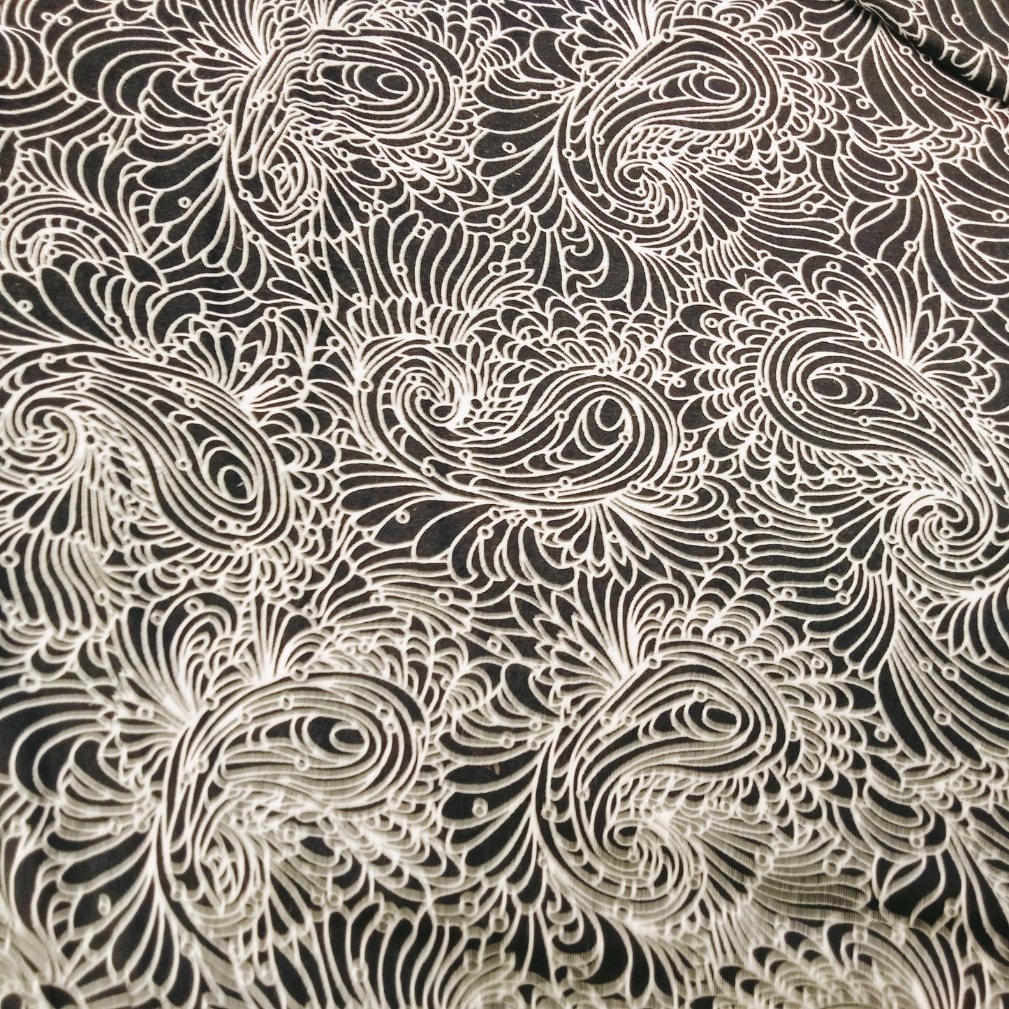 paisley printed knit jersey - sold by 1/2mtr