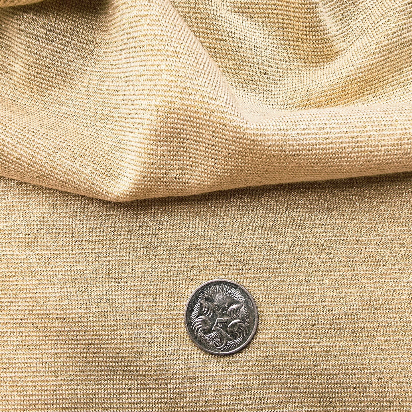 Jersey glitter knit fabric - sold by 1/2mtr
