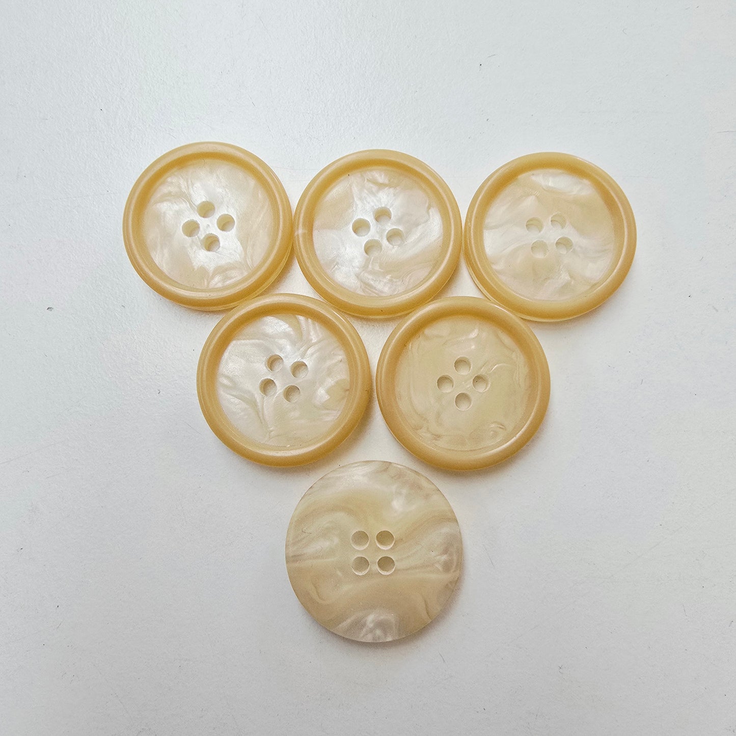 Pearl/honey shade 4 hole button