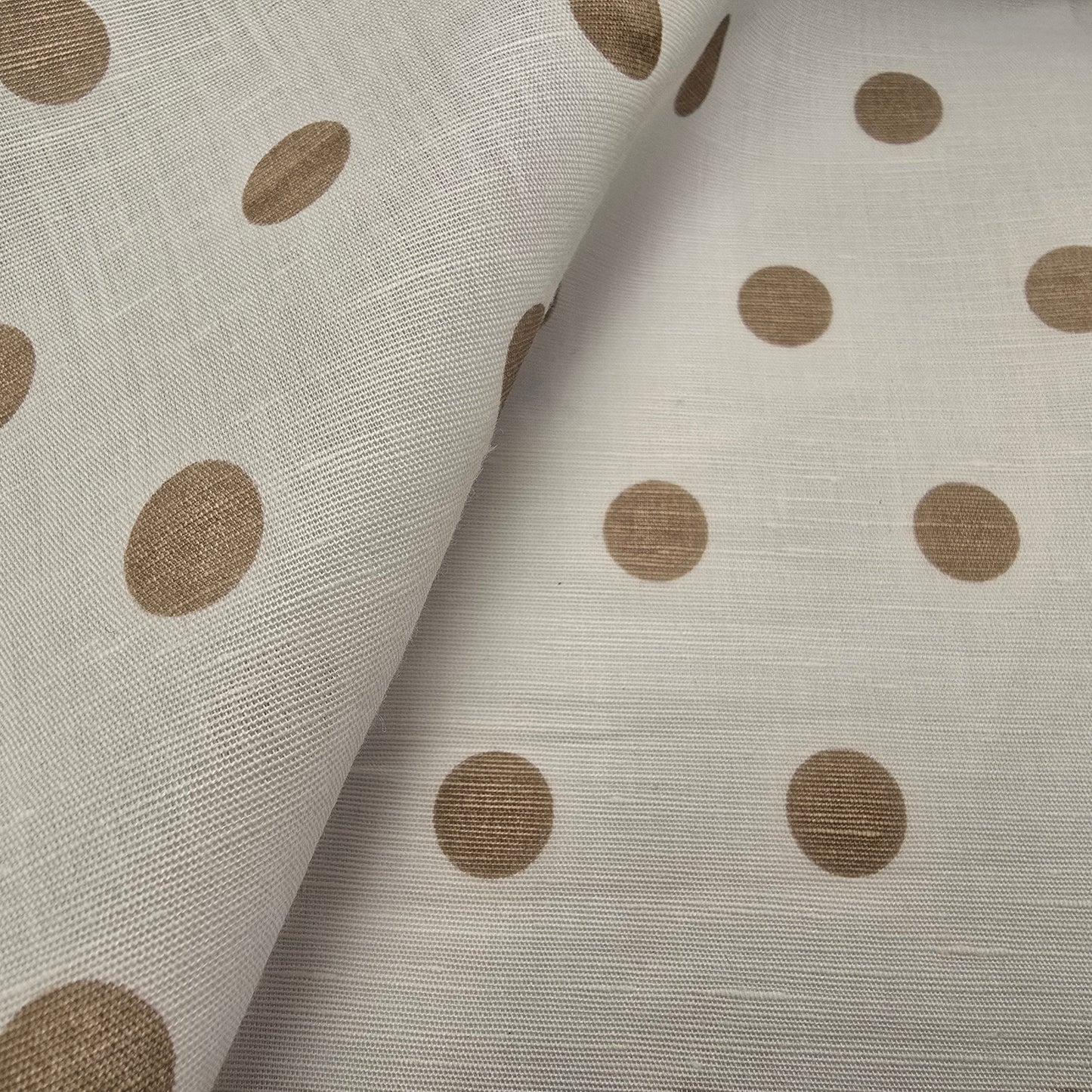 Polka dot printed cotton/linen fabric sold by 1/2mtr