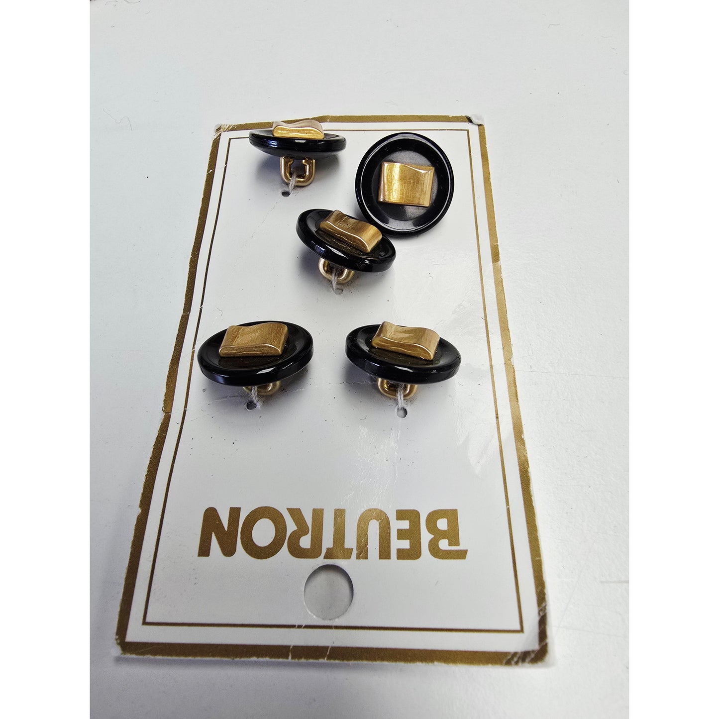 Black/gold shank buttons - 5