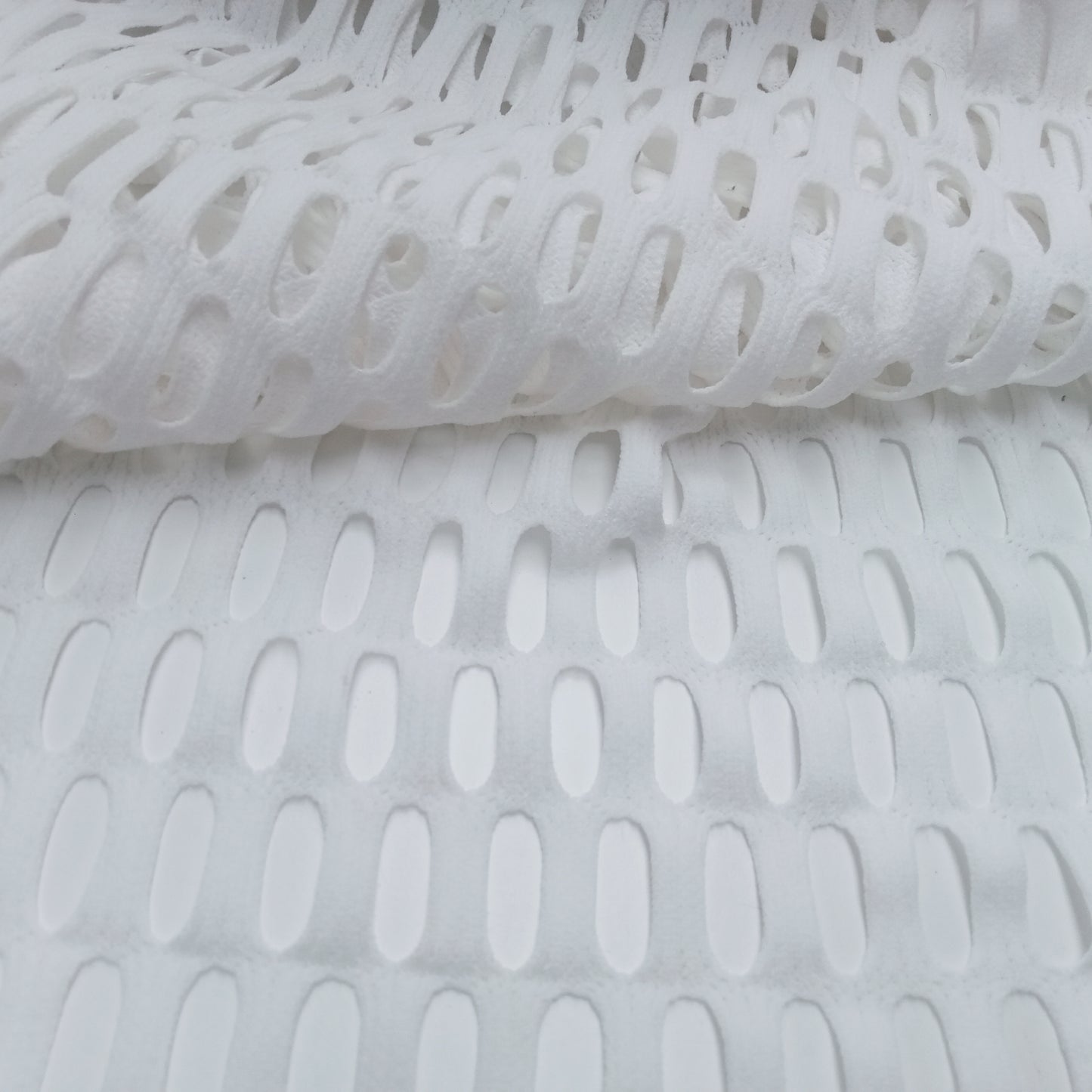 Mesh large eyelet design - white - sold by 1/2mtr