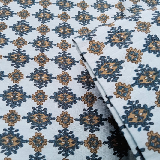 Printed woven cotton fabric - sold by 1/2mtr