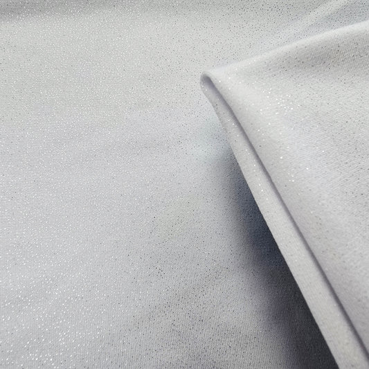 Capri-white silver foil jersey - sold by 1/2mtr
