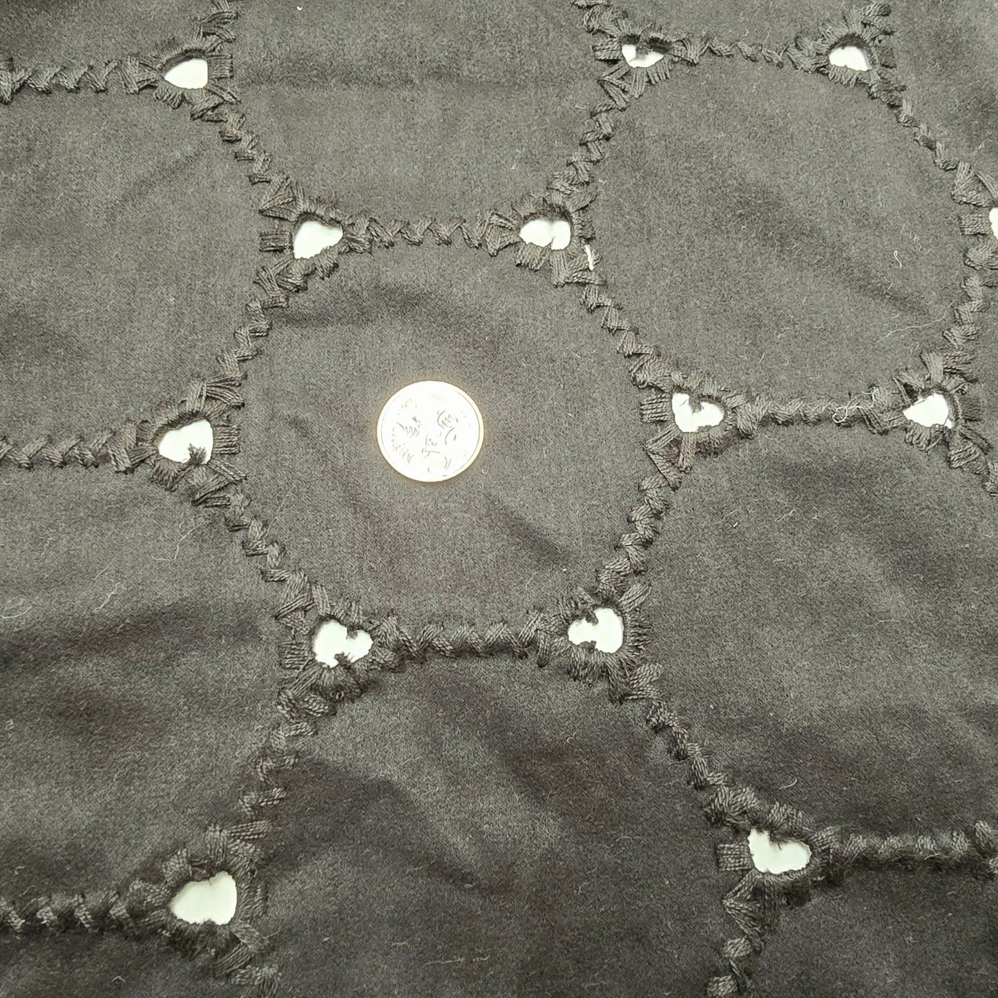 Circles cutout suede fabric - sold by 1/2mtr