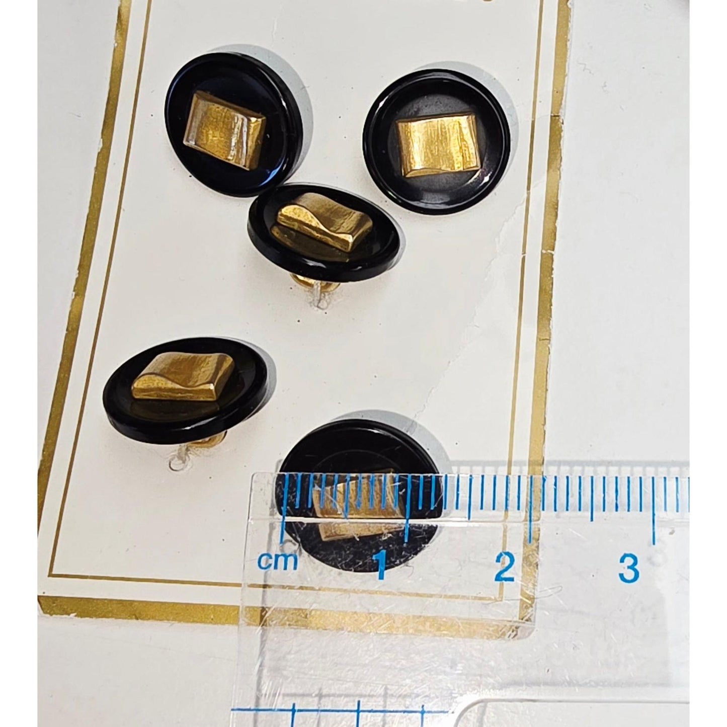 Black/gold shank buttons - 5