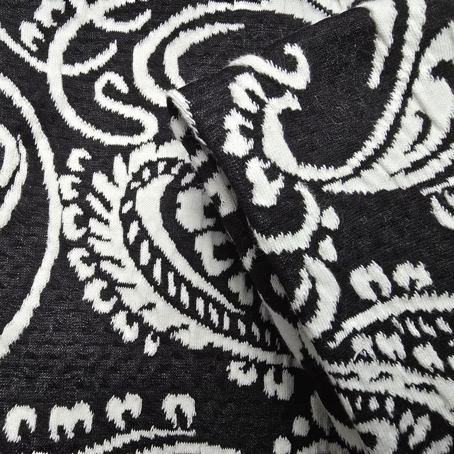 Conge - Jacquard design fabric - black/ivory sold by 1/2mtr
