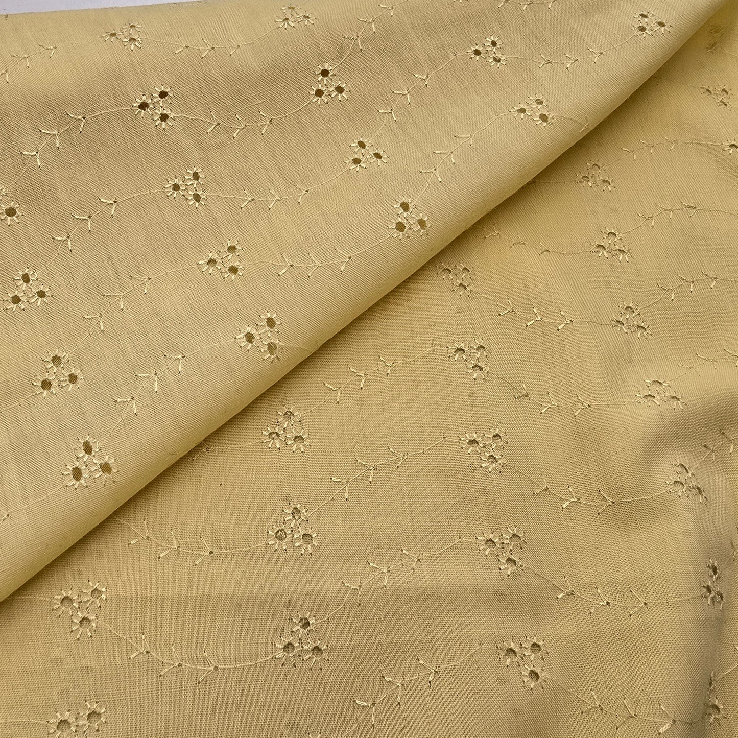 Mustard broidery anglaise woven fabric -1.50mtrs