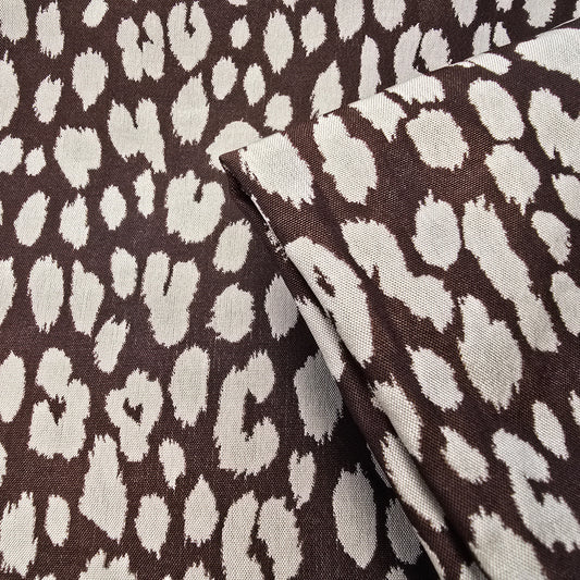 Leopard printed woven fabric - sold by 1/2mtr
