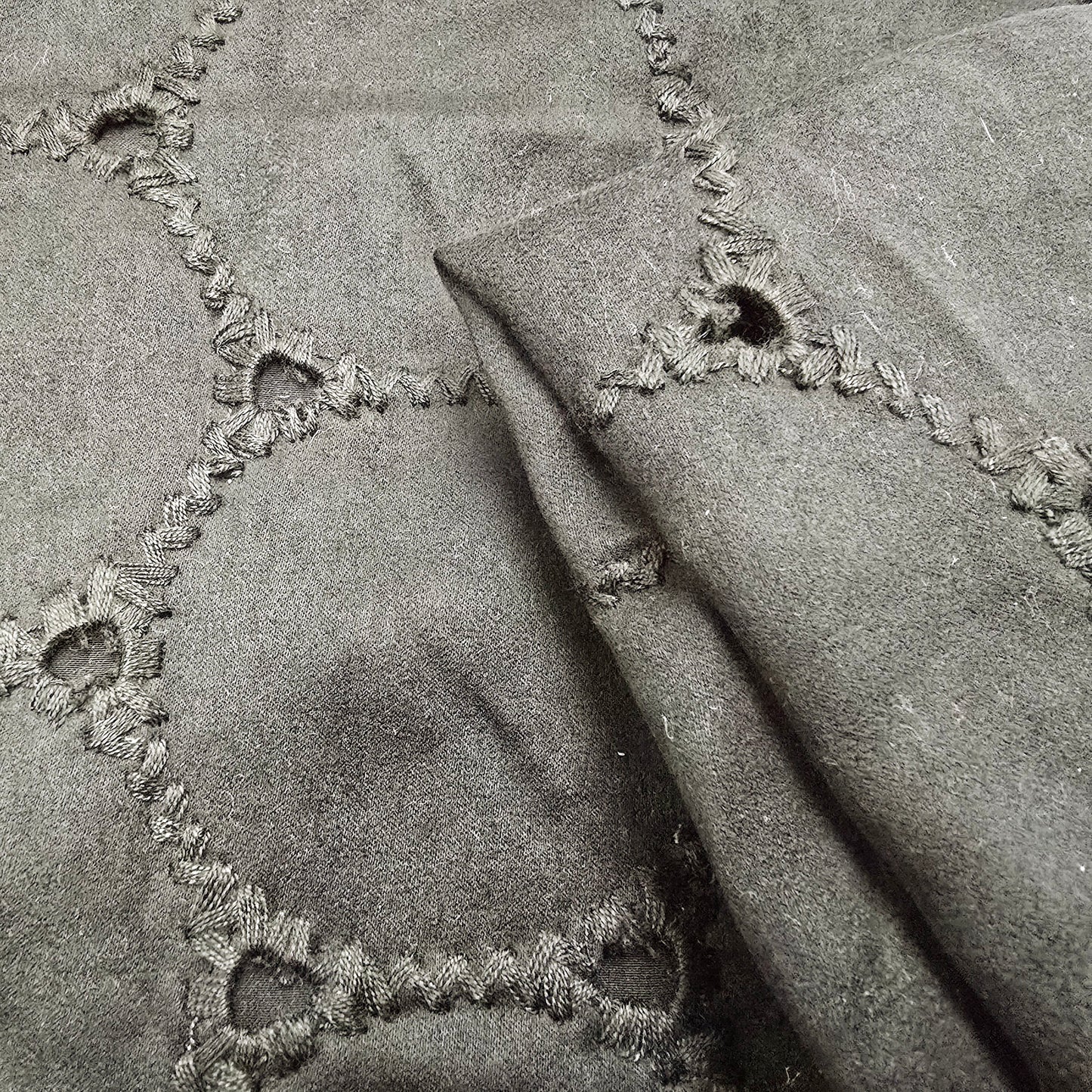 Circles cutout suede fabric - sold by 1/2mtr